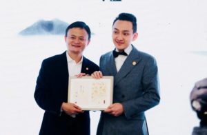 Jack Ma presents Justin Sun, creator of Tron (TRX), with Diploma